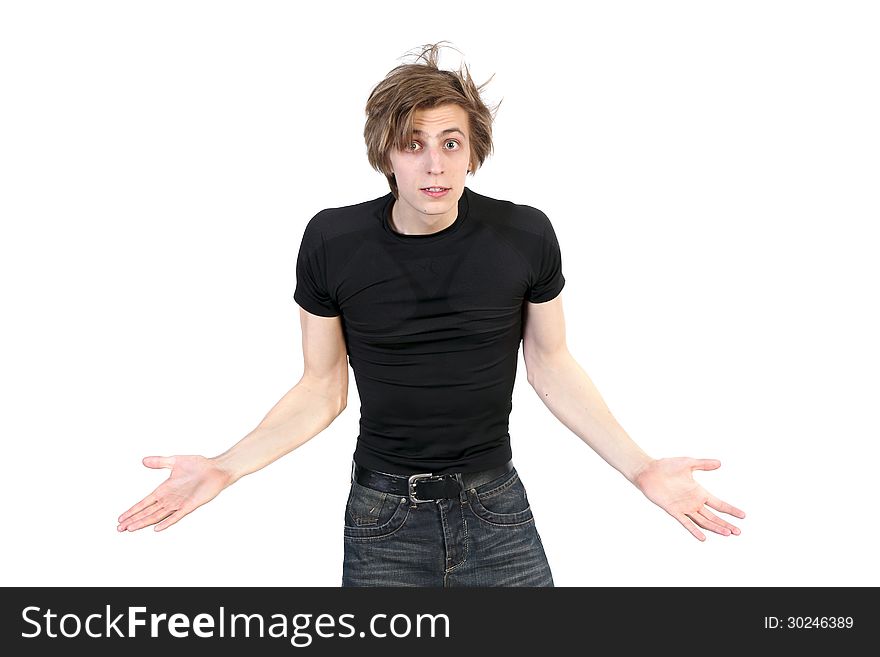 Portrait of indignant young man gesticulates hands on white background. Portrait of indignant young man gesticulates hands on white background