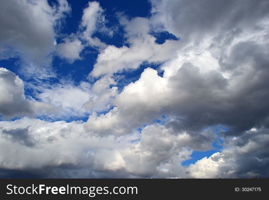 Lot of white clouds on blue sky background. Lot of white clouds on blue sky background