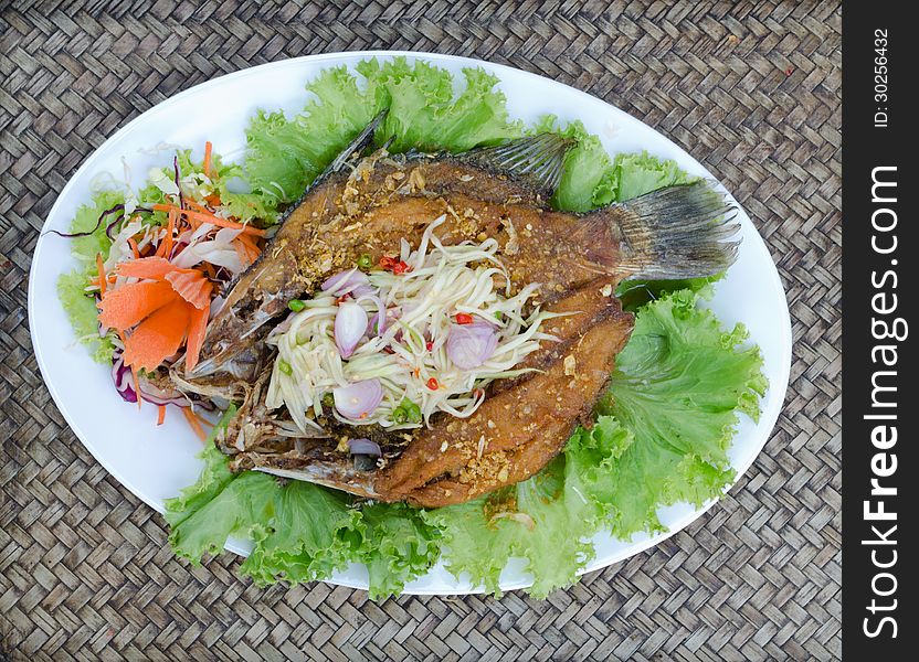 Tilapia fish fried with mango salad. Tilapia fish fried with mango salad