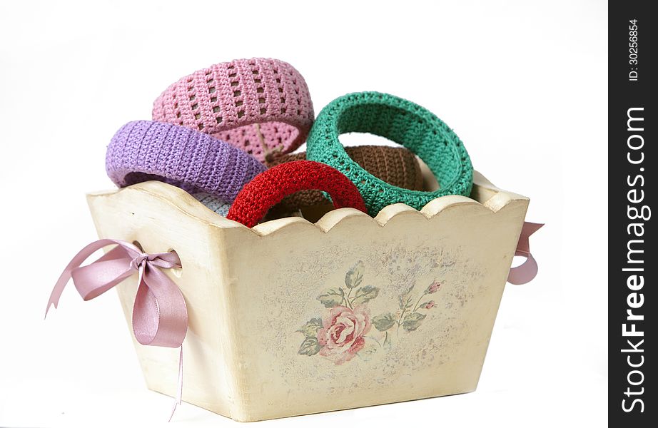 Basket with bracelets and jewellery. Basket with bracelets and jewellery