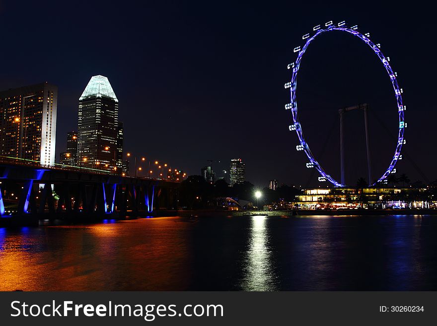 Singapore Flyer night panorama with Nicholl Highway bridge. Singapore Flyer night panorama with Nicholl Highway bridge