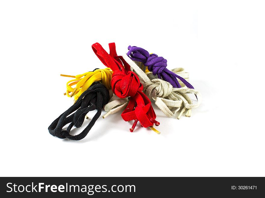 Colour shoelace, white, purple, black, yellow, on white background