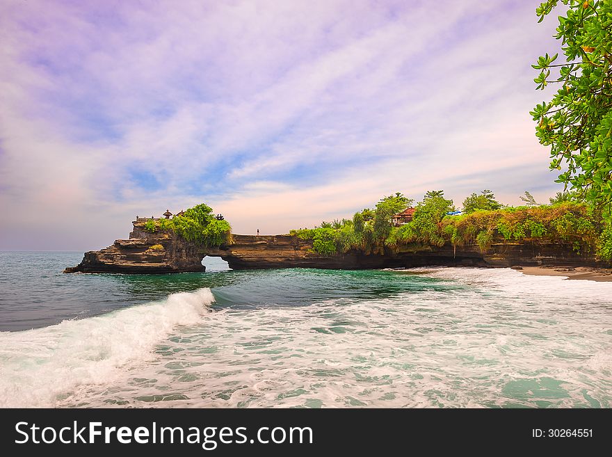 Indonesia Bali island.Tanah Lot in the vicinity of Dragen head dam looked tide. Indonesia Bali island.Tanah Lot in the vicinity of Dragen head dam looked tide.