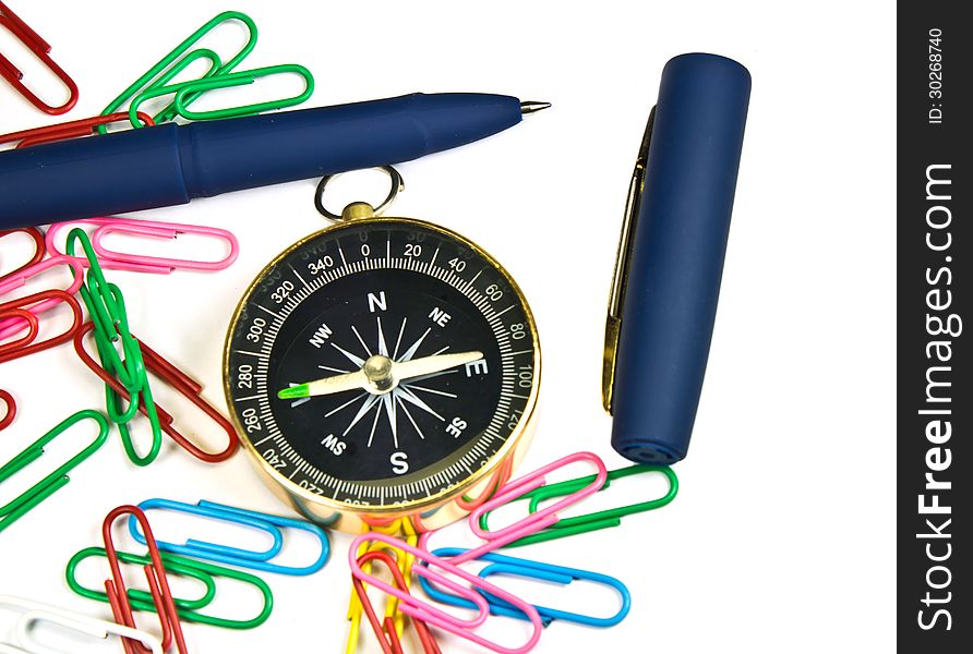 Paper Clips, Pens, Compass On White Background