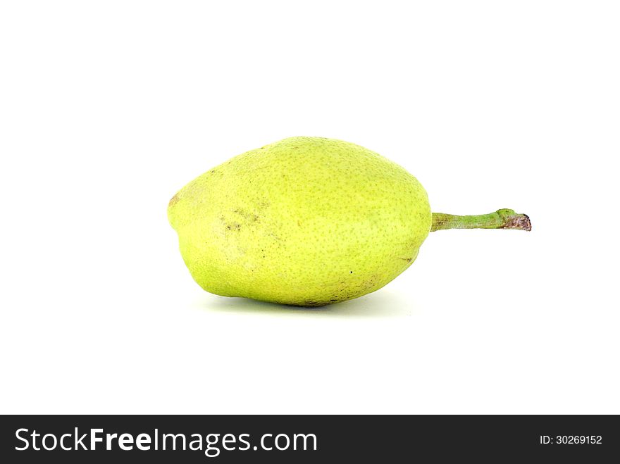 A green pear on the white background. A green pear on the white background.