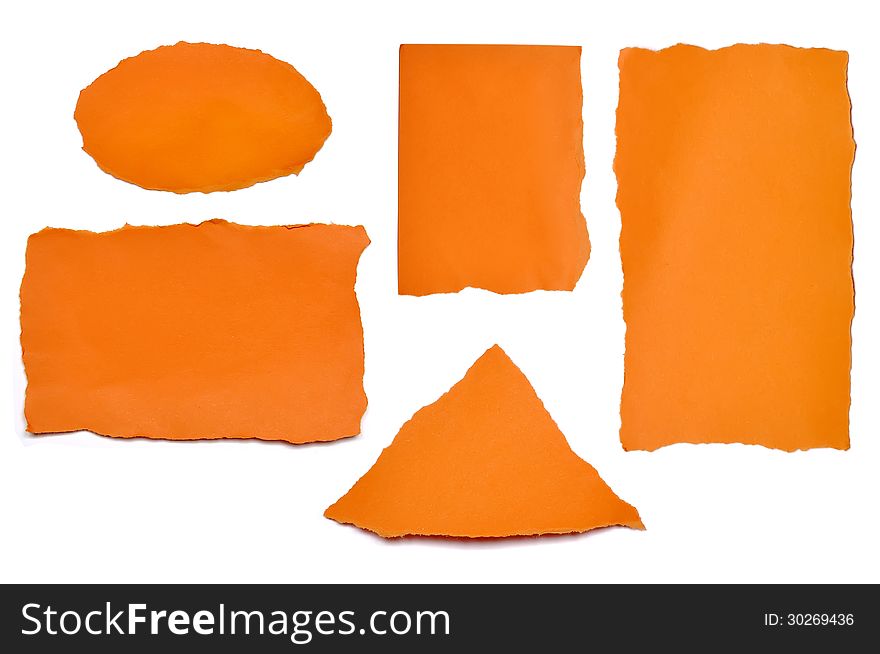 Collection of paper orange tears, isolated on white with soft shadows. Collection of paper orange tears, isolated on white with soft shadows.