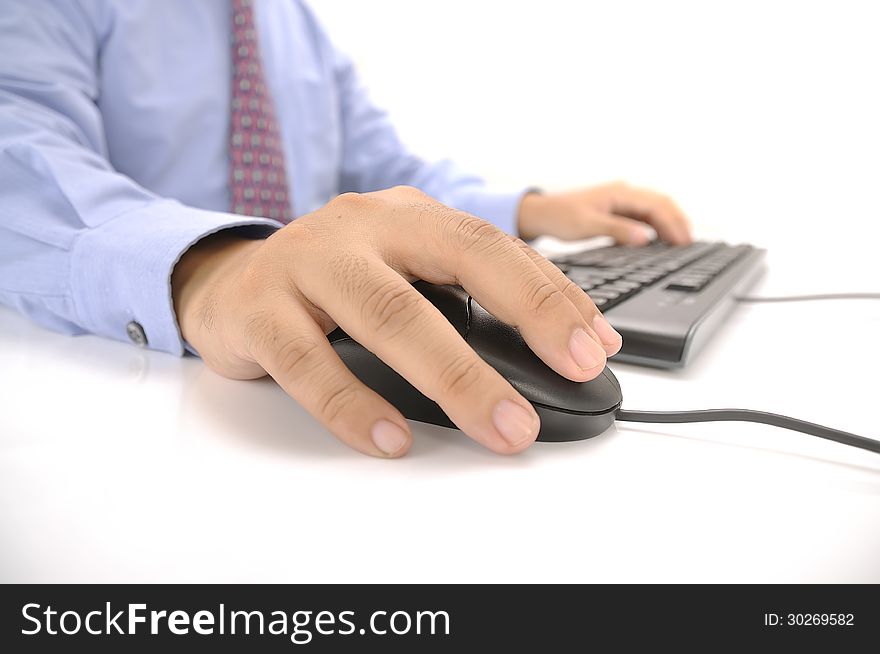 Hands typing on keyboard. This is office environment concept