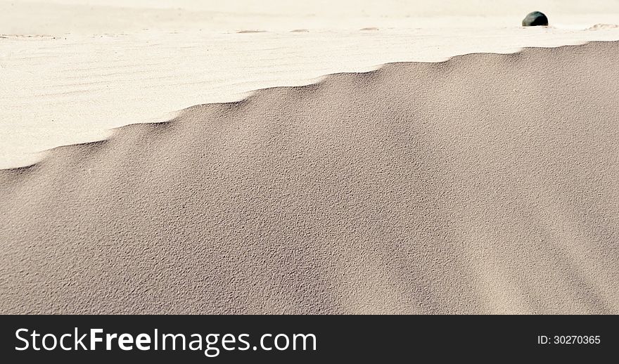 Wind pattern in dune sand on the beach. Wind pattern in dune sand on the beach