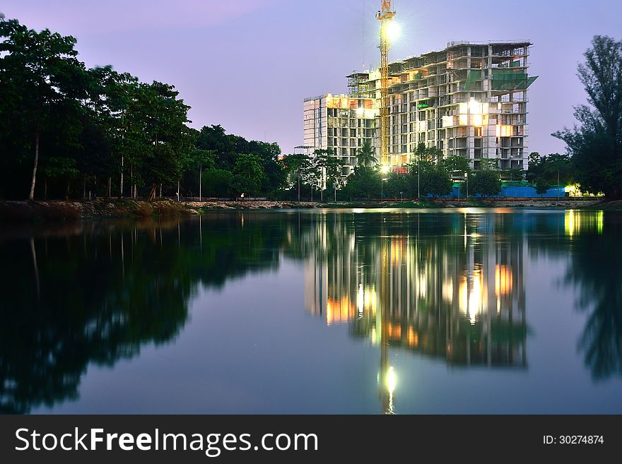 Building construction site at night time