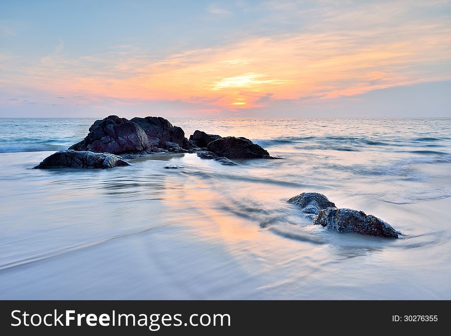 Sea wave on the beach at sunset time. Sea wave on the beach at sunset time