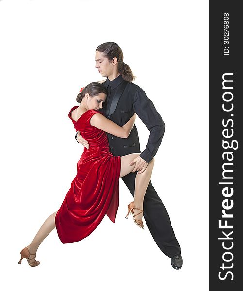 Young couple dancing tango isolated over white