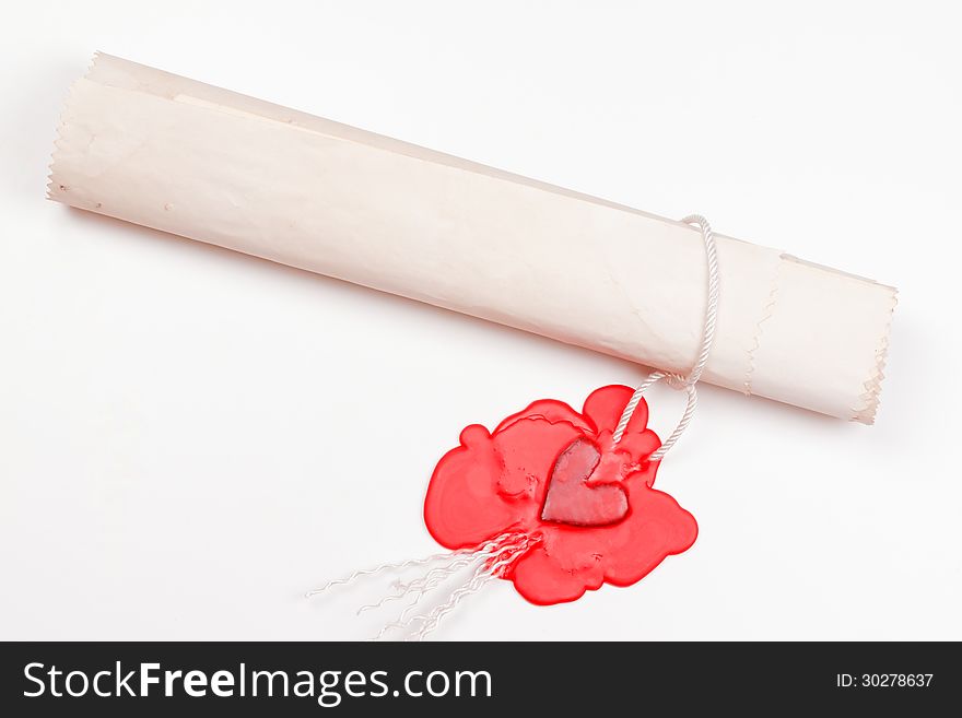 Love letter sealed the seal in the form of heart in red sealing wax