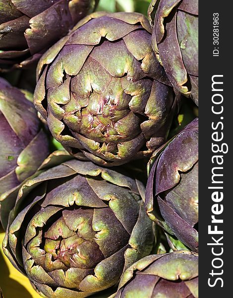 Group of artichokes in a market