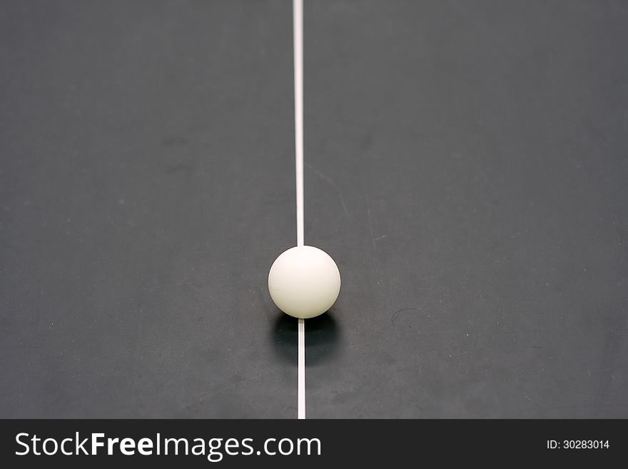 Ping-pong ball on table tennis table. Ping-pong ball on table tennis table