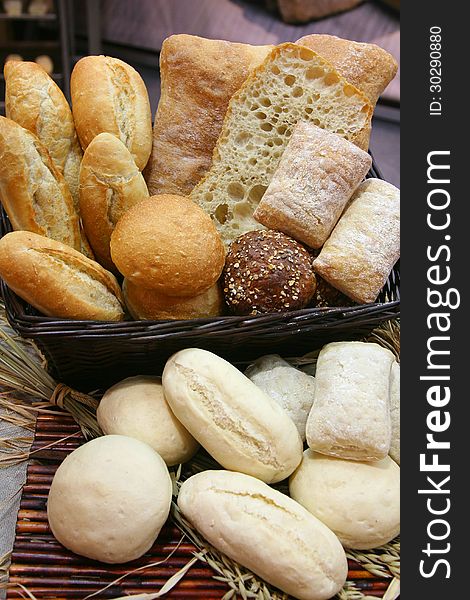 Bred basket with french roll and wheat. Bred basket with french roll and wheat
