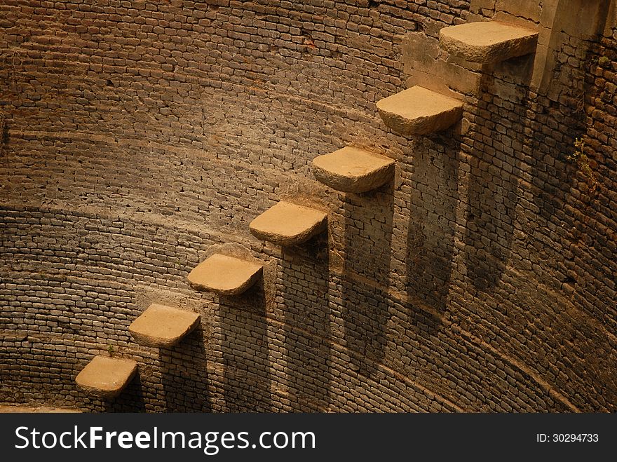 View of a portion of well with steps inside. View of a portion of well with steps inside