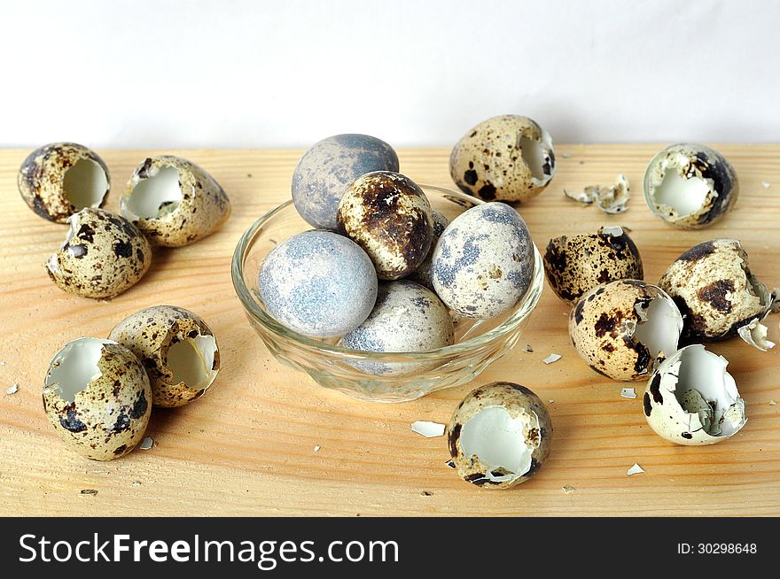 Background of quail eggs in a plate and shell. Background of quail eggs in a plate and shell.