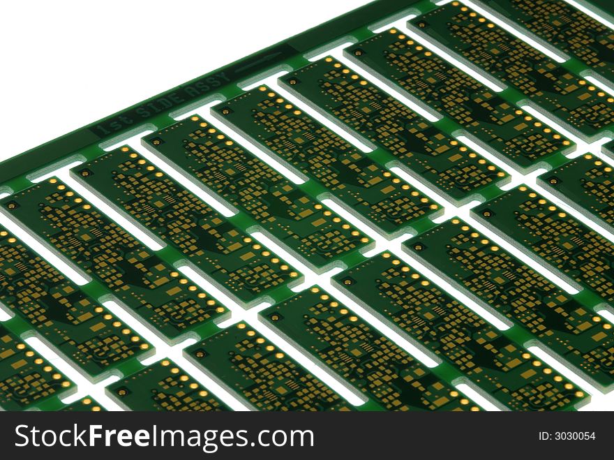 Close up detail of a Printed Circuit Board on a white background