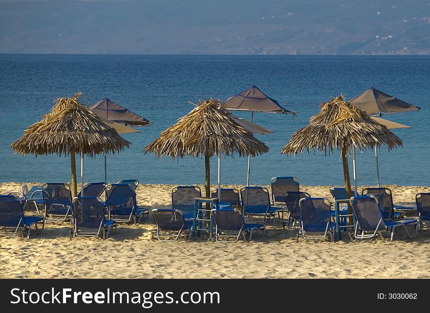 Sky-blue lagoon and sandy beach in Greece. Sky-blue lagoon and sandy beach in Greece