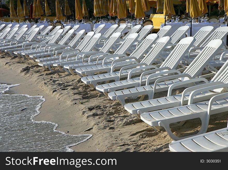 Alignment of beach chair in the evening sun. Alignment of beach chair in the evening sun