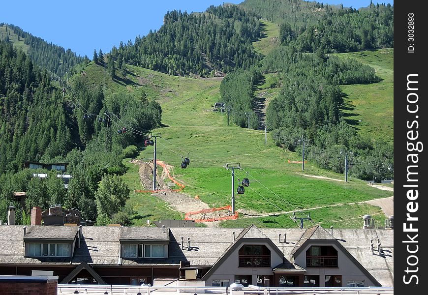 Mountain Condo Rooftops with Gondola in Background. Mountain Condo Rooftops with Gondola in Background