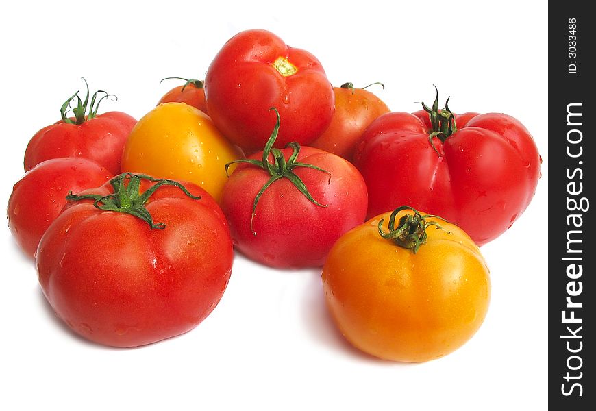 Tomatoes on white background, close up