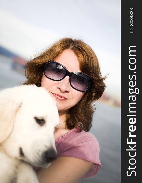 Woman close up portrait with dog outdoor. Woman close up portrait with dog outdoor