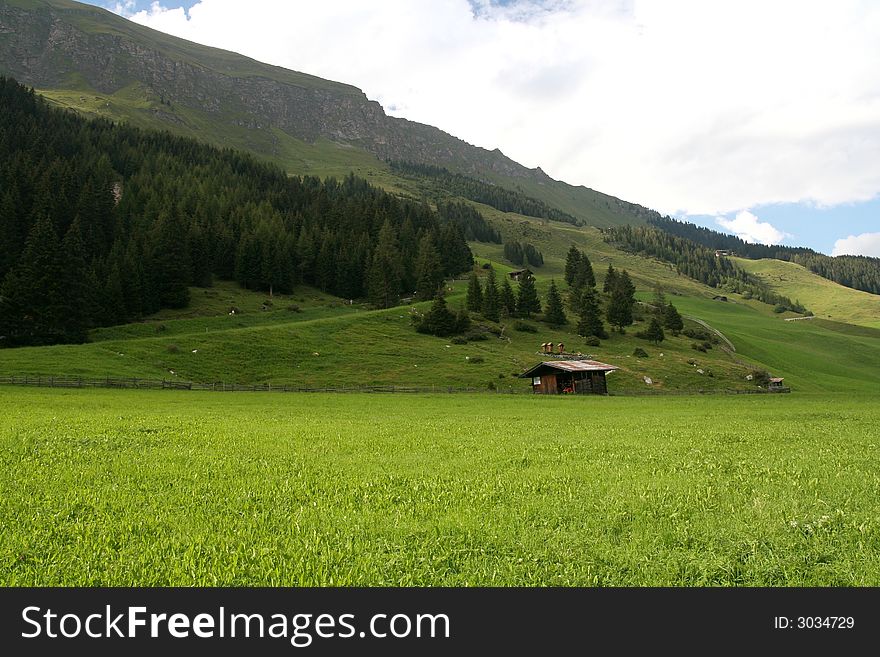 Image of a mountain landscape with cloudy sky captured in Austrian Tirol