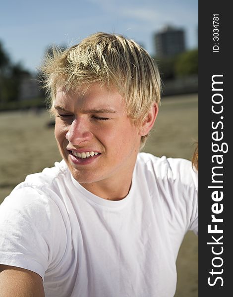 Man close up portrait over beach and sky