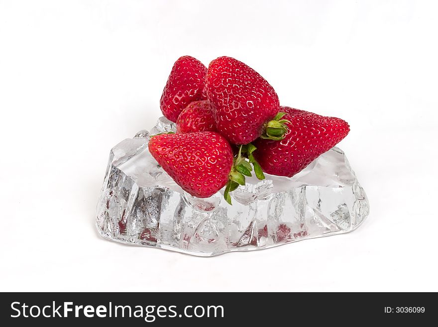 Fresh ripe red strawberries on ice