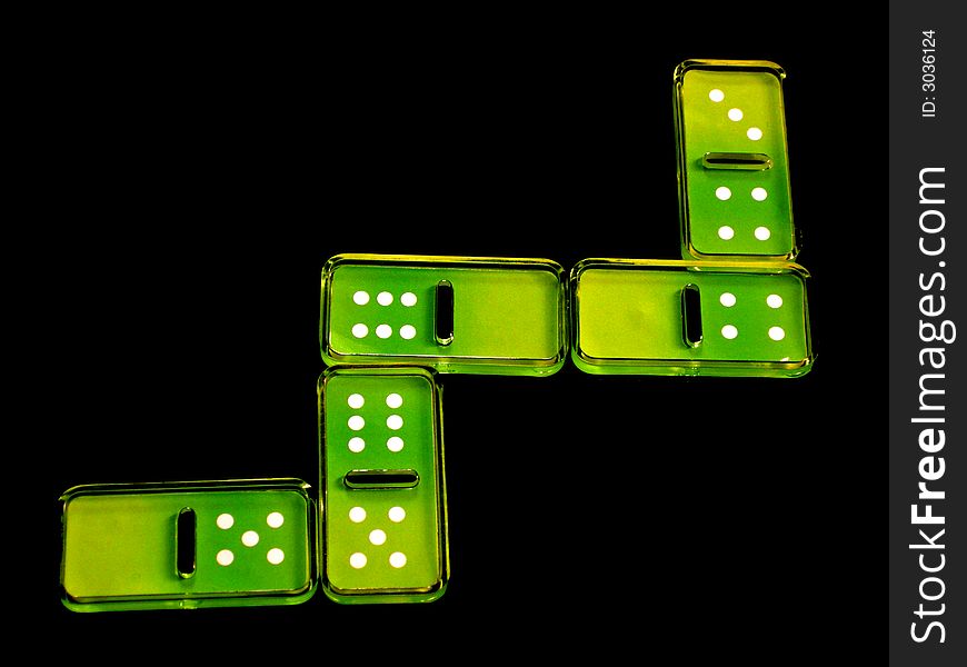 Domino green pieces in a black background