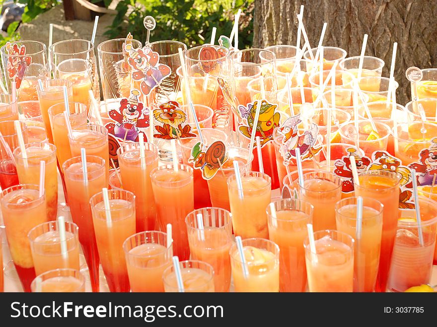 Red - orange cocktails in glases