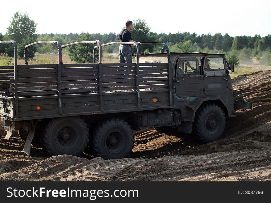 Old Russian military truck in raw terrain