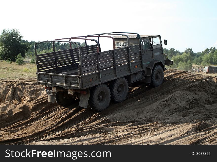 Old Russian military truck in raw terrain