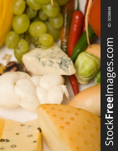 Foodstuff composition with cheese, chilli,grape. Foodstuff composition with cheese, chilli,grape