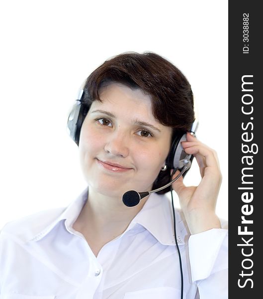 Attractive smiling woman with a headset on white. Attractive smiling woman with a headset on white