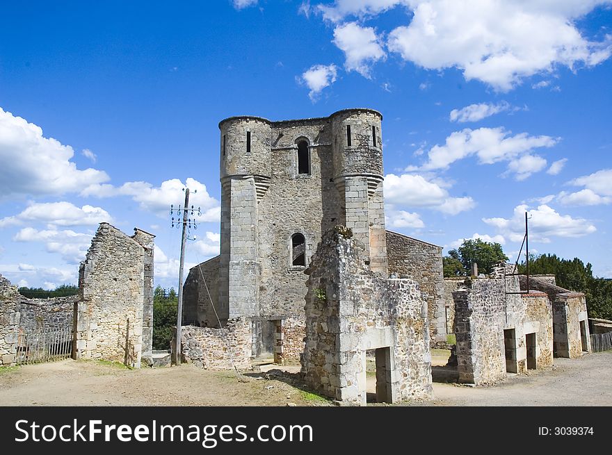 Church standing in the middle of a destroyed village