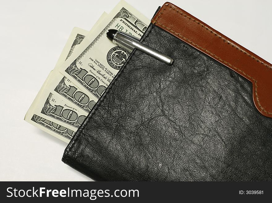 Four hundred bills sticking out of the wallet