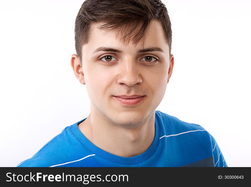 Young man smiling isolated on white background