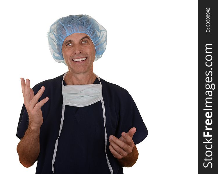 Doctor wearing navy blue scrubs and blue hair cover with mask hanging down smiling with hands up isolated on white. Doctor wearing navy blue scrubs and blue hair cover with mask hanging down smiling with hands up isolated on white