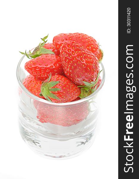 Jar filled with beautiful strawberries on white background. Jar filled with beautiful strawberries on white background