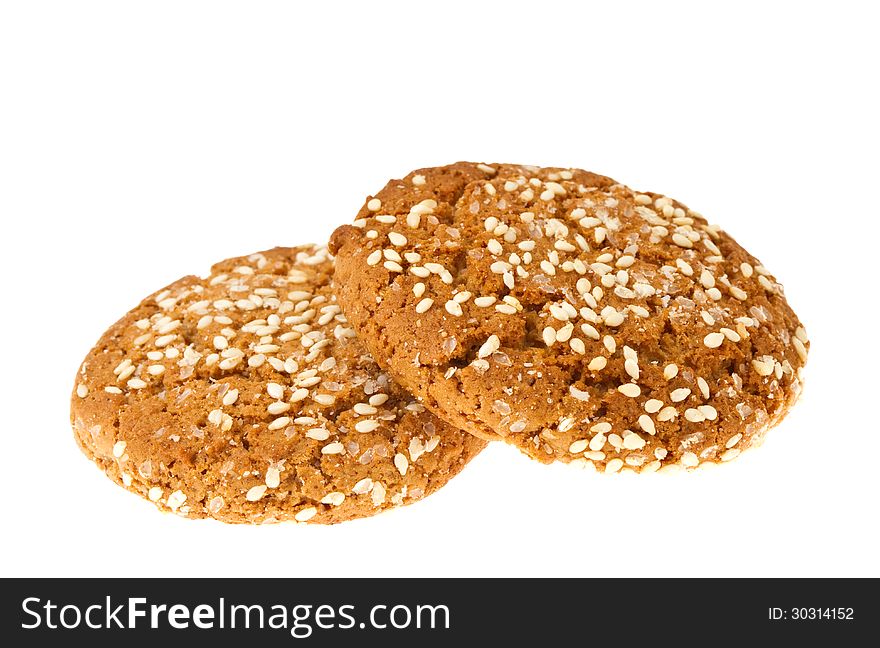 Oat cookies with sesame isolated on white