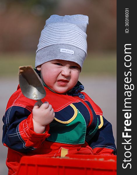 Little boy in the sandbox