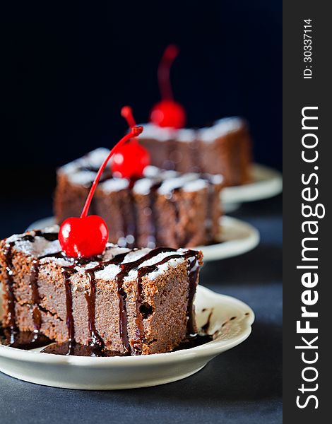 Close up photograph of a slice of chocolate cake. Close up photograph of a slice of chocolate cake