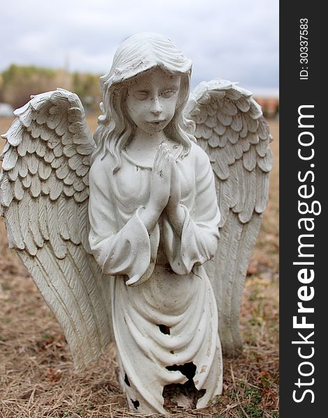 Old Stone Prayerful Angel At Graveside