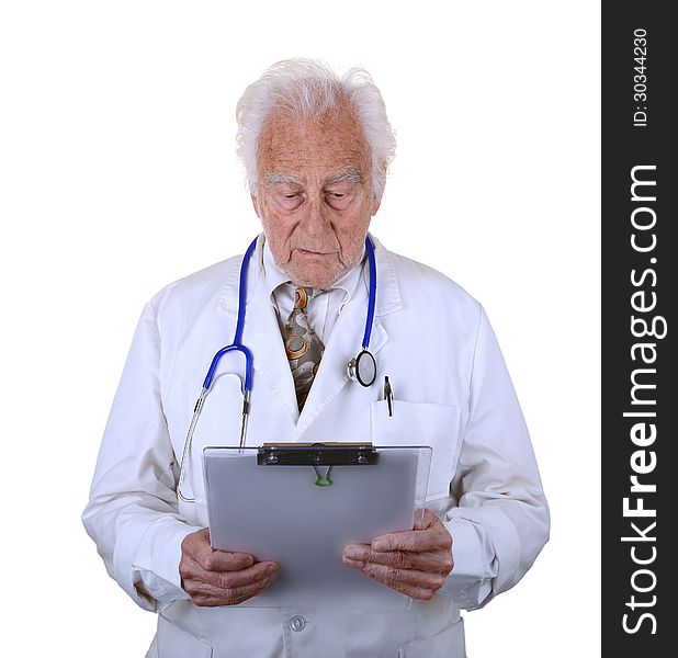 Senior doctor wearing a white lab coat and blue stethescope looking down at clip board. Senior doctor wearing a white lab coat and blue stethescope looking down at clip board