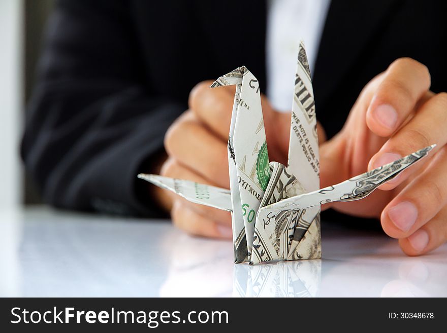Business Man Hand Holding Origami Paper Cranes
