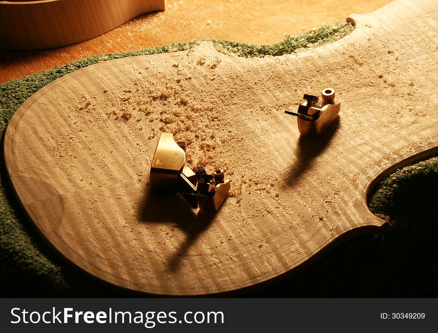 Guitar being handcrafted by student in class