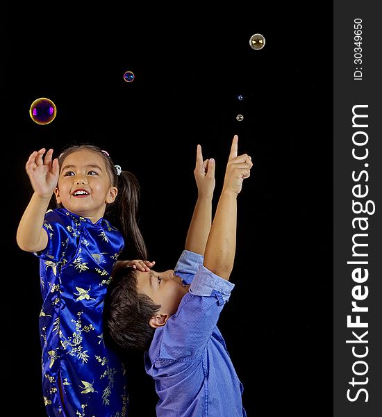 Philippino Children Playing With Bubbles