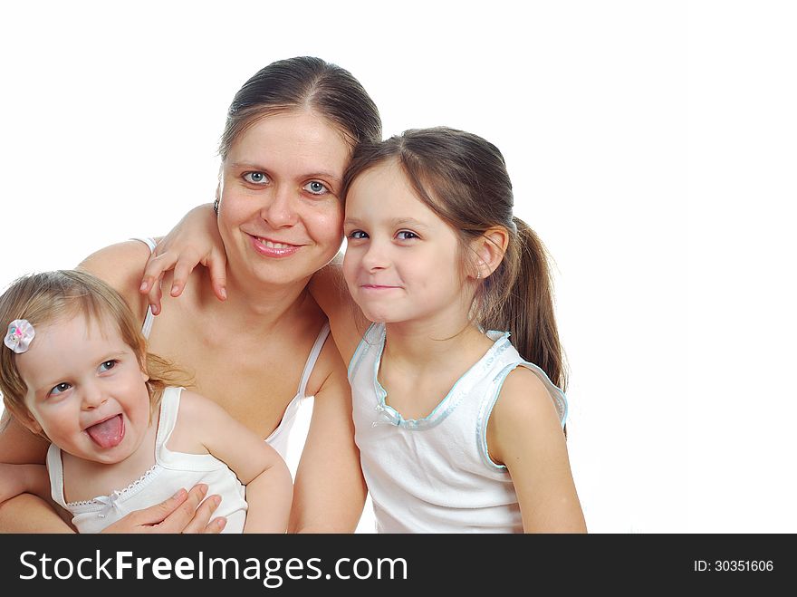 Mother with daughters isolated on white. This image has attached release.